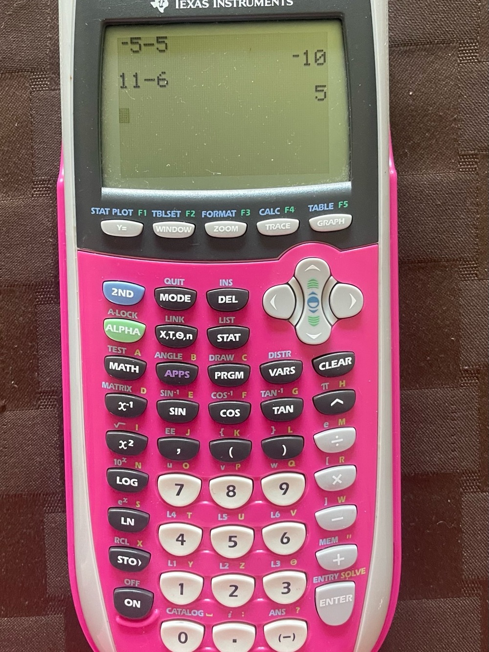 Texas Instruments Pink Graphing Calculator with White Trim